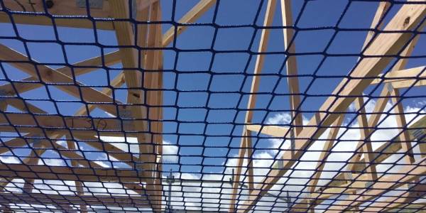 Construction safety net installed in the structure