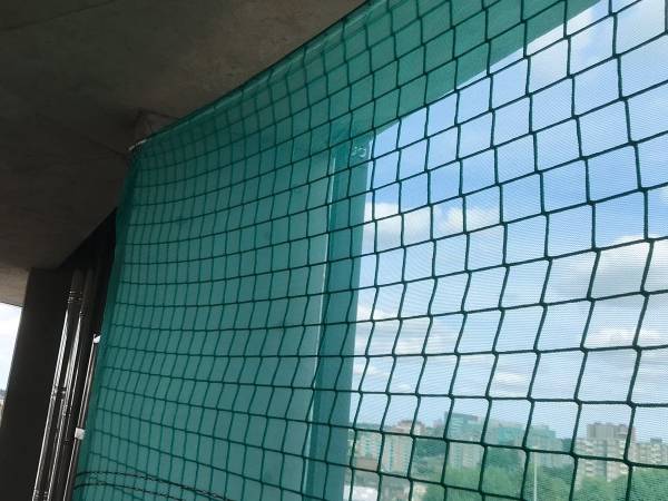 Construction safety net installed on the construction walls