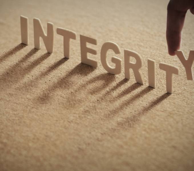 The word integrity is placed on the ground.