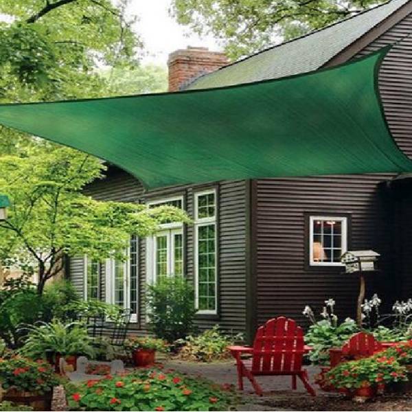 Sun shade sail installed in the garden