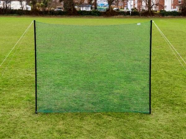 Golf driving wall placed on the lawn