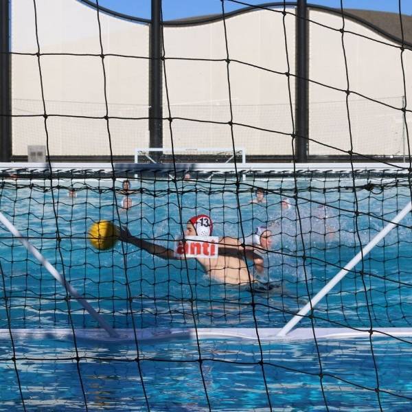Sports perimeter net is installed around the water polo court.
