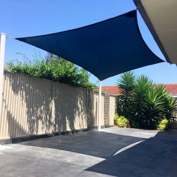 Sun shade sail installed on the backyard