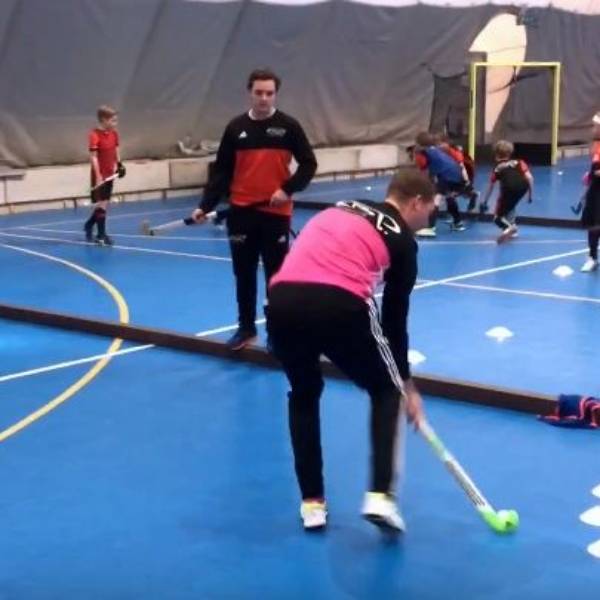 Players are taking part in hockey training.