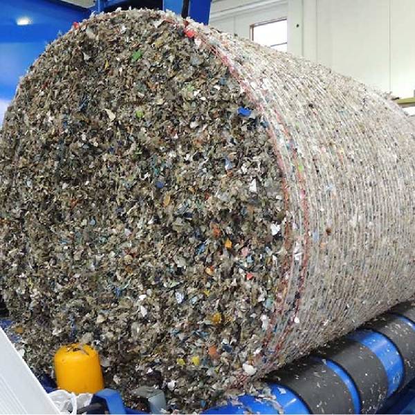 Baled waste plastic on the machine